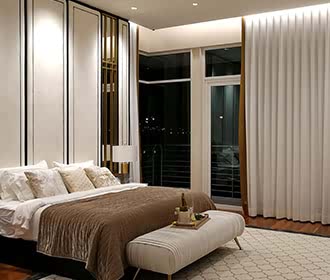 a bedroom with a bed and a bench