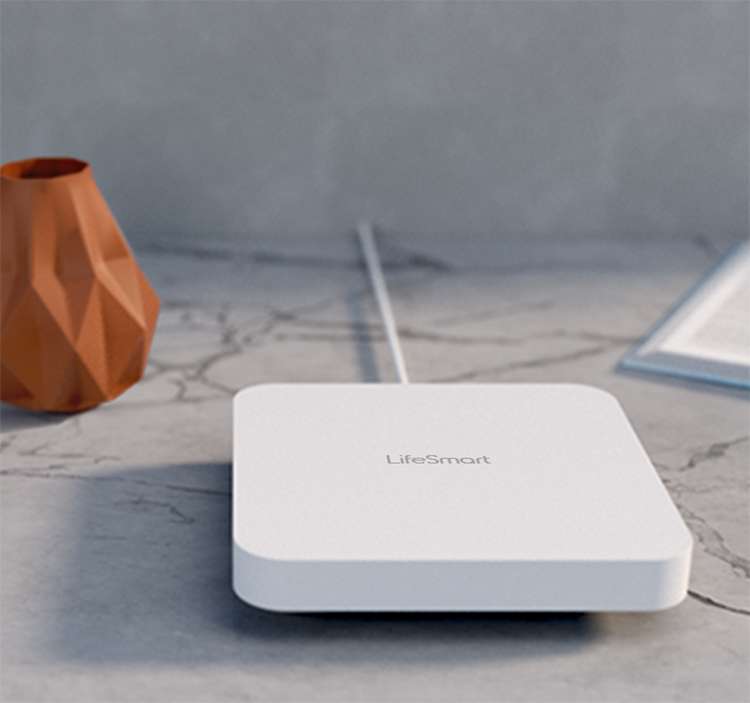 Smart Home 3 a white box with a wire attached to it